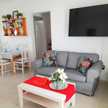 Vincent, Cozy And Sunny Over The Rooftops Puerto del Carmen (Lanzarote)