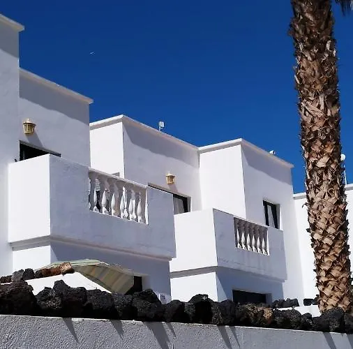 Vincent, Cozy And Sunny Over The Rooftops Puerto del Carmen (Lanzarote)