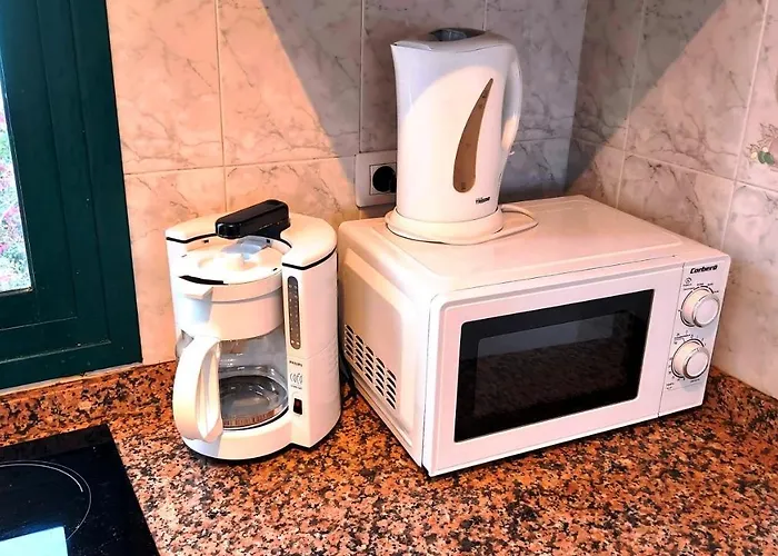 Vincent, Cozy And Sunny Over The Rooftops شقة بويرتو ذيل كارمين